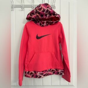 Nike dri-fit size girls small hoodie.  Light stain on cuff.